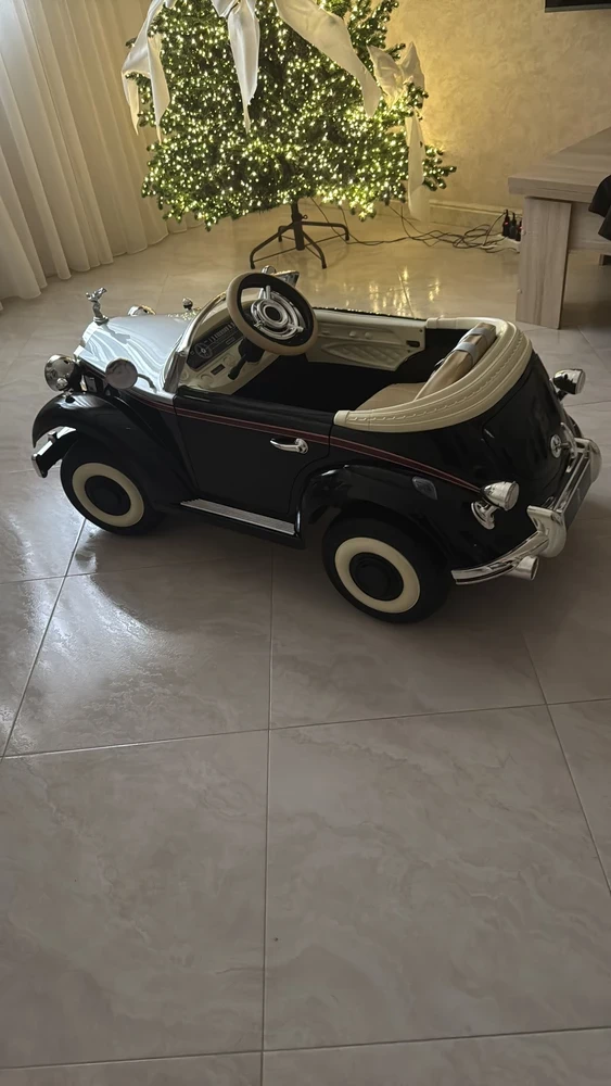 Электромобиль RIVER TOys Roils - Royca  черный глянец