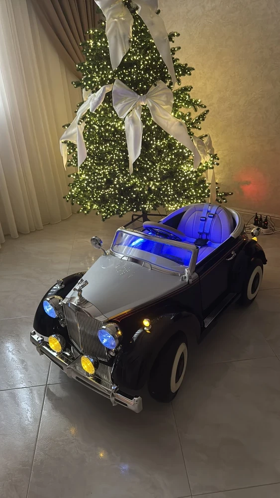 Электромобиль RIVER TOys Roils - Royca  черный глянец